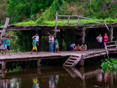 community by river in Paraguay