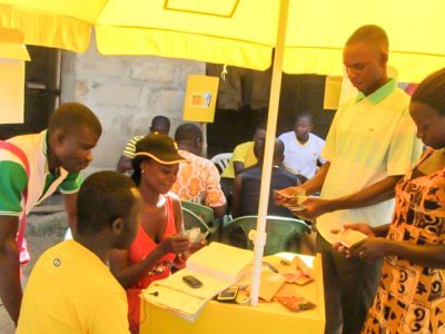 Ghana ADVANCE Beneficiaries of the mobile money service carrying out a transaction