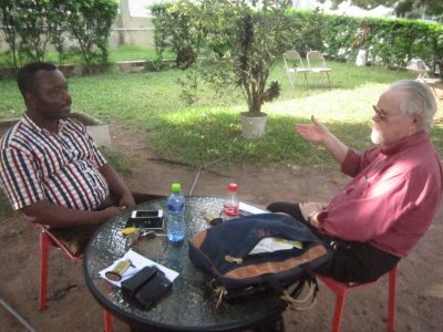 ACDI/VOCA volunteer Phil Smith with the general director of a poultry company in Kumasi