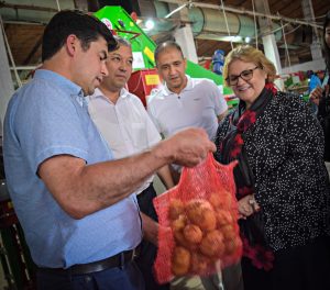 Abdurahimov is demonstrating potato packaging in Kyrgyzstan