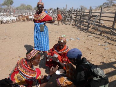 ACDI/VOCA USAID Kenya Regal Ag women holding money