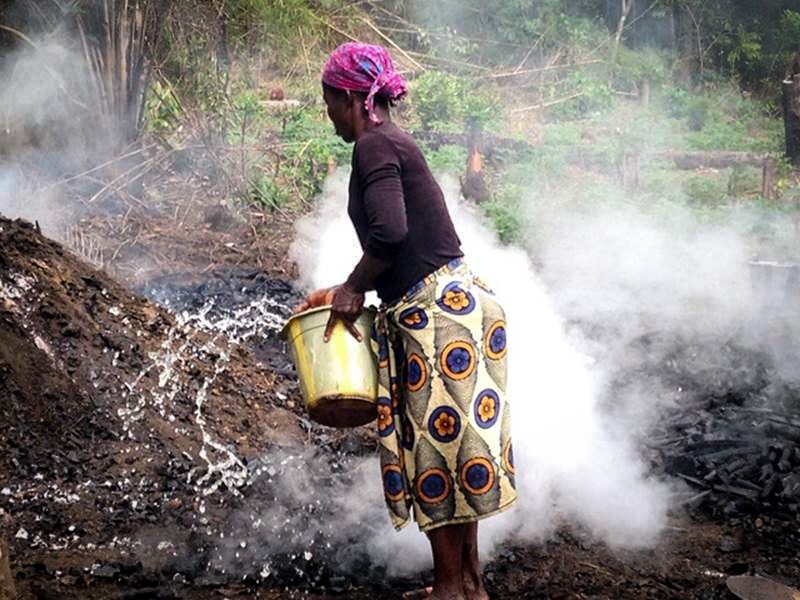 Former Syngenta employee Julia Moore trains farmers in Liberia as part of Farmer-to-Farmer