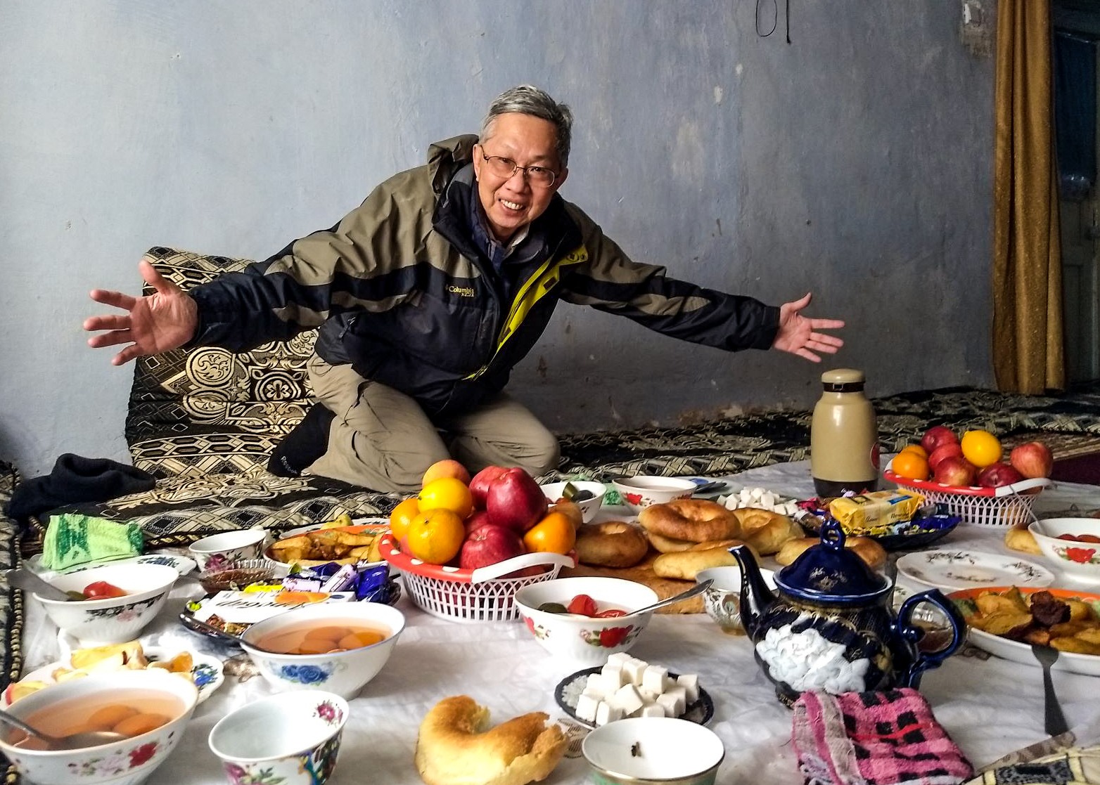 Man displaying bounty of home grown food