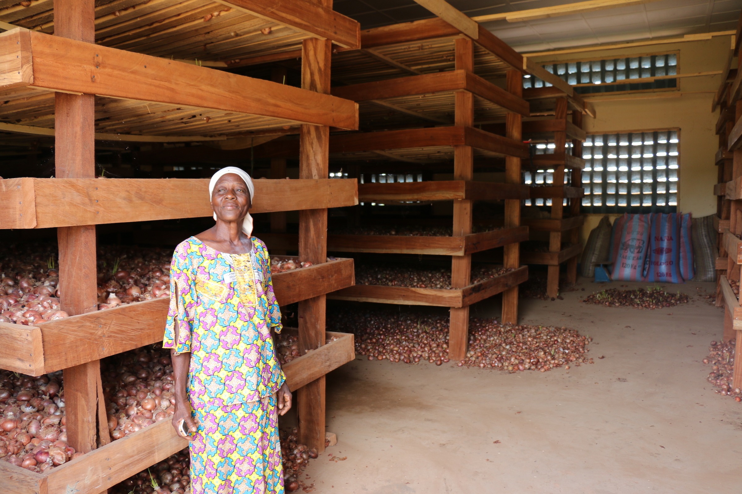 Pascaline-onion-farmer-in-warehouse-Burkina-Faso