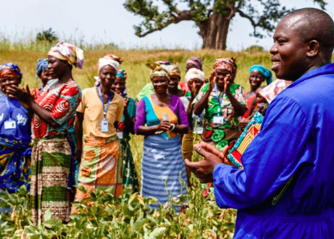 Man leading women outside