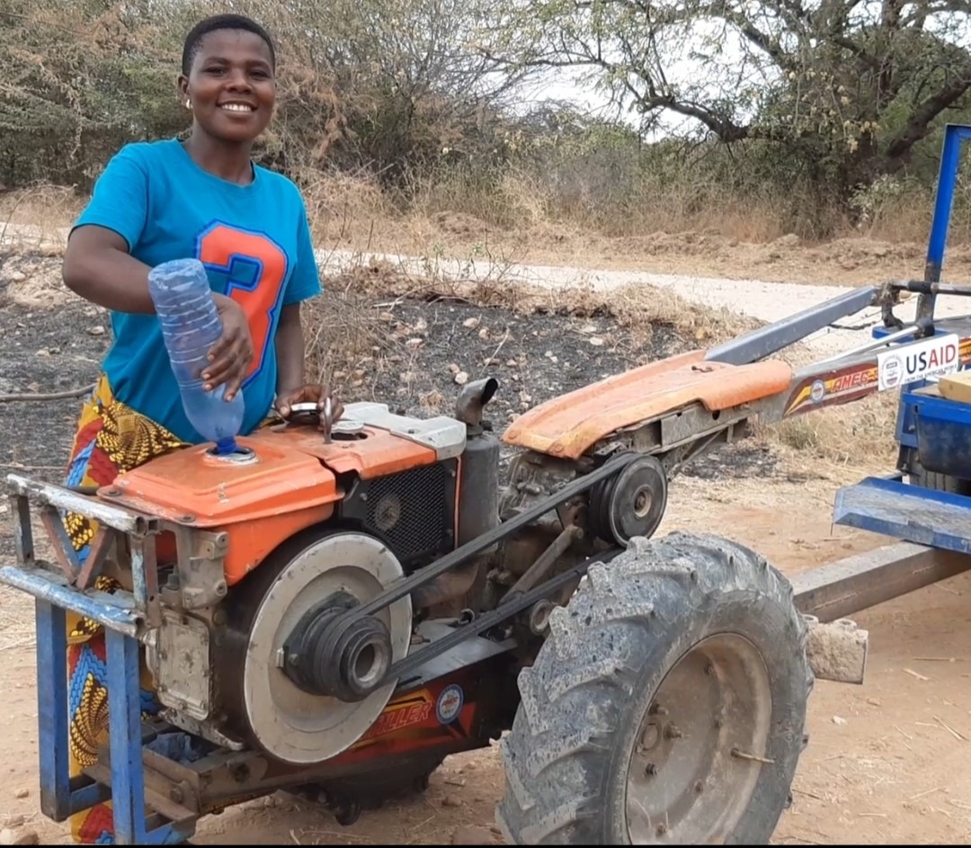 Tanzania_NAFAKA_youth with tractor