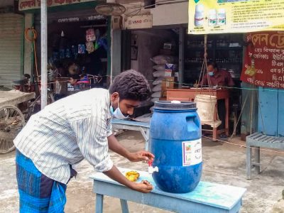 Bangladesh-RDC-man handwashing station